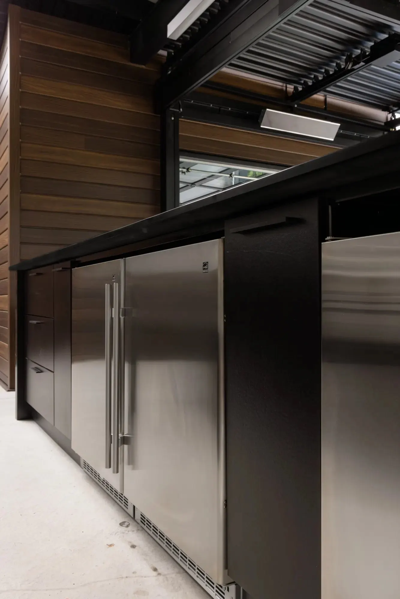 Two runs and a pool — cabinetry and counter edge in detail